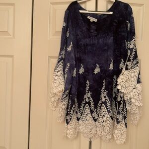 Adorable top, looks very nice with white jeans